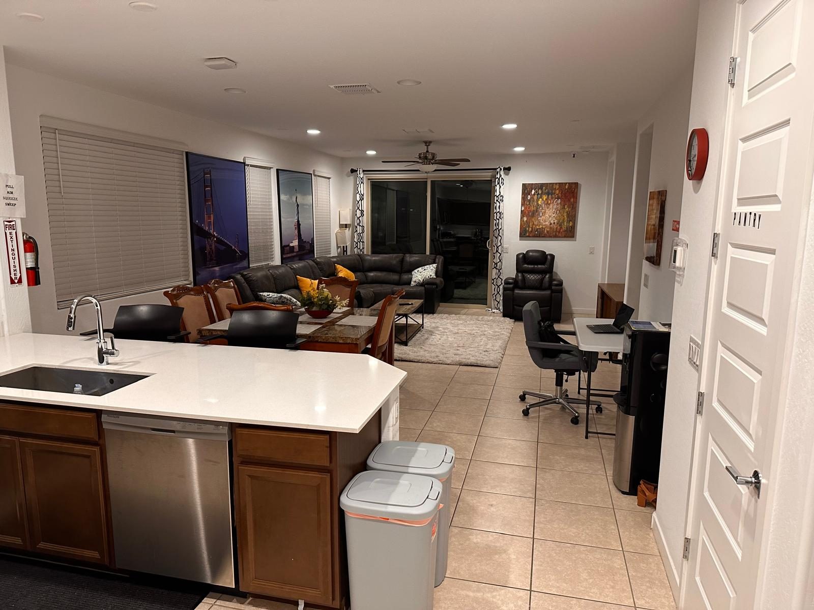 A warm, well-kept kitchen and living area inside a DiVnity residence
